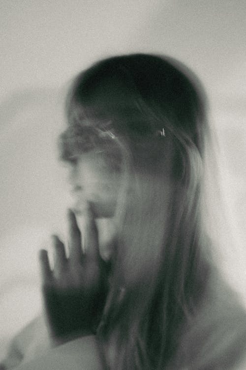 Blurred Woman with Long Hair