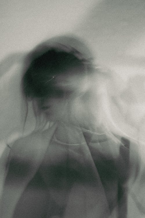 Black and White Blurry Abstract Photo of a Woman 