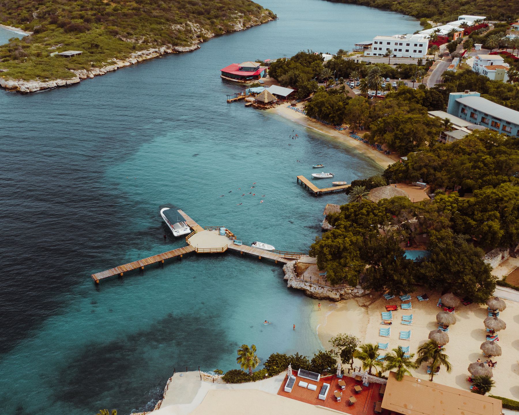 Aerial view of real coastal resorts and clear Caribbean water in Curaçao