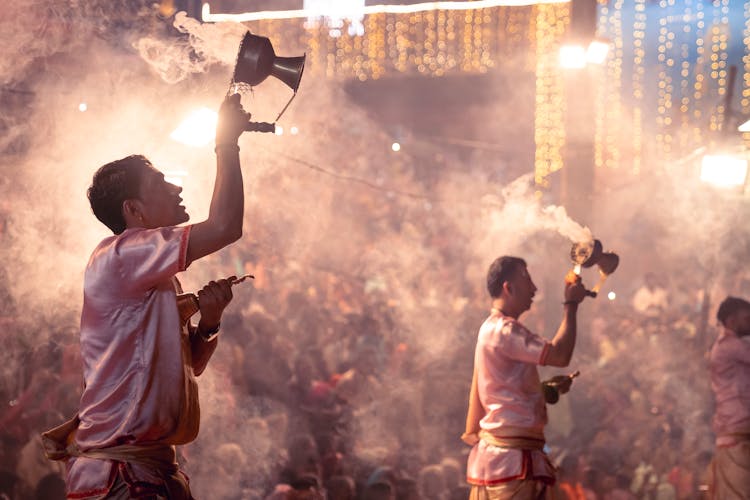 Men With Incense Over Crowd On Gathering