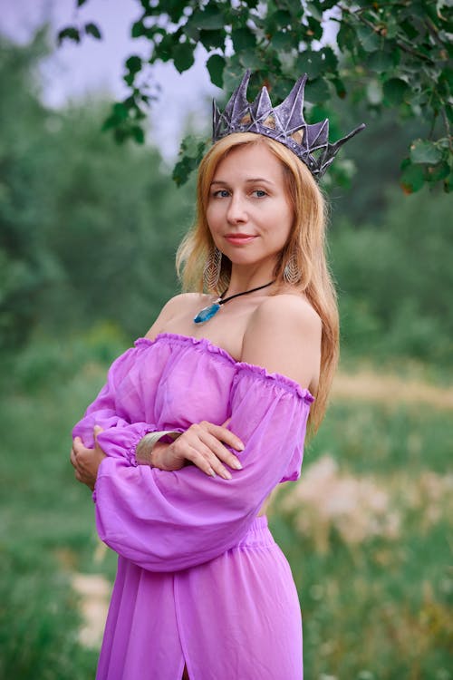 Portrait of a Woman Wearing Purple Dress