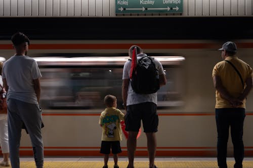 Father and Son at Railway Station Platform