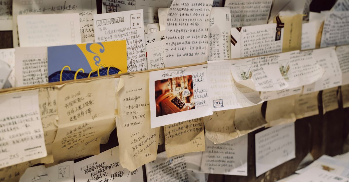 Paper Written Full Wall Filled with Written Papers · Free Stock Photo