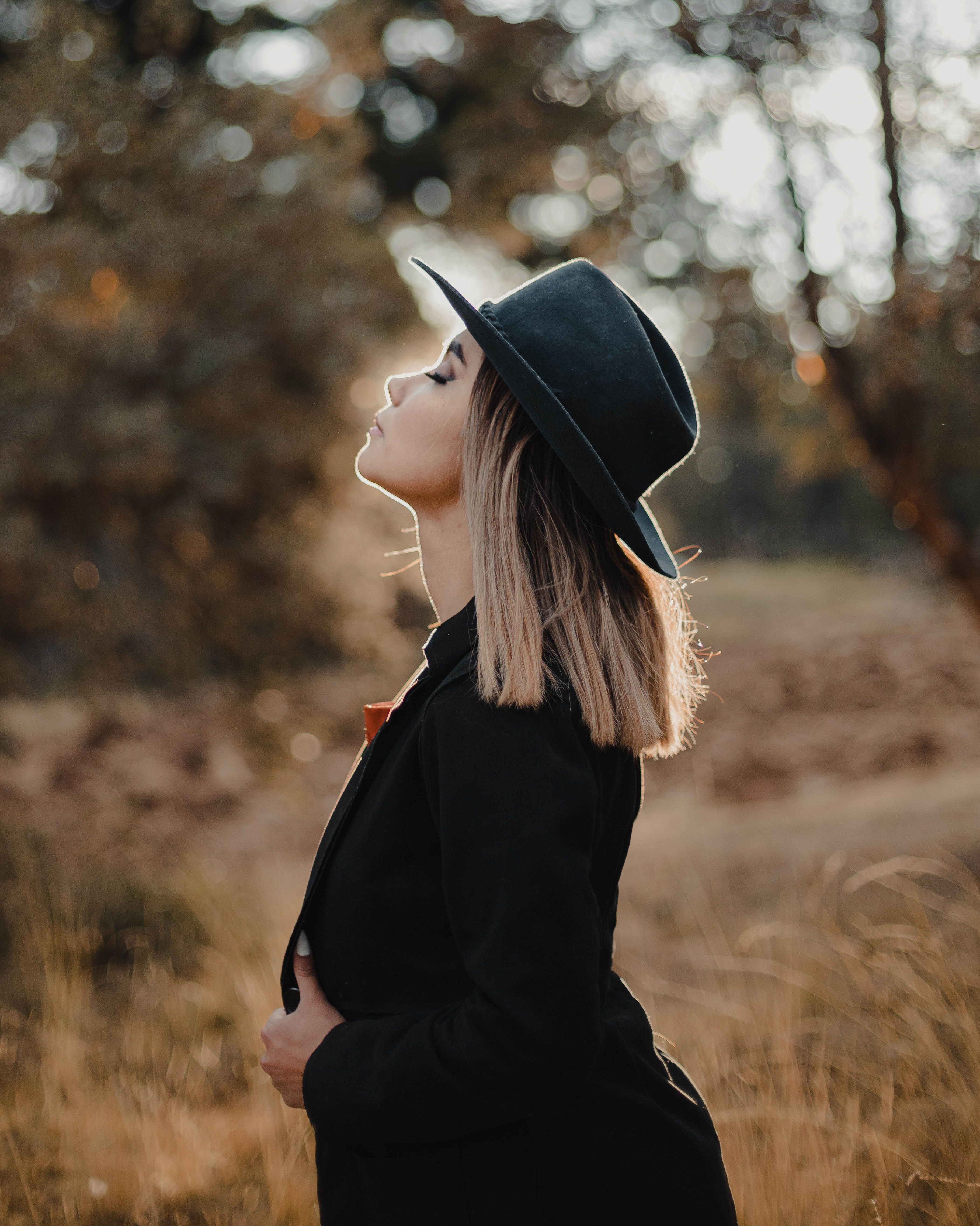 Woman Wearing a Black Hat · Free Stock Photo