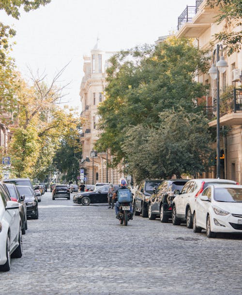 Cars Parked on a Street 