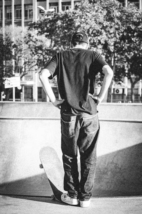 Man with Skateboard in Black and White