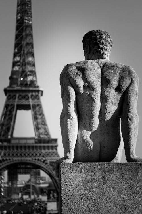 Man Sculptue with Eiffel Tower behind