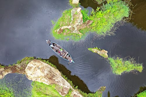 Group Of People On Boat 