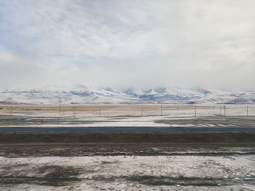 Free Captivating view of snow-covered plains and mountains in Tibet, China. Stock Photo