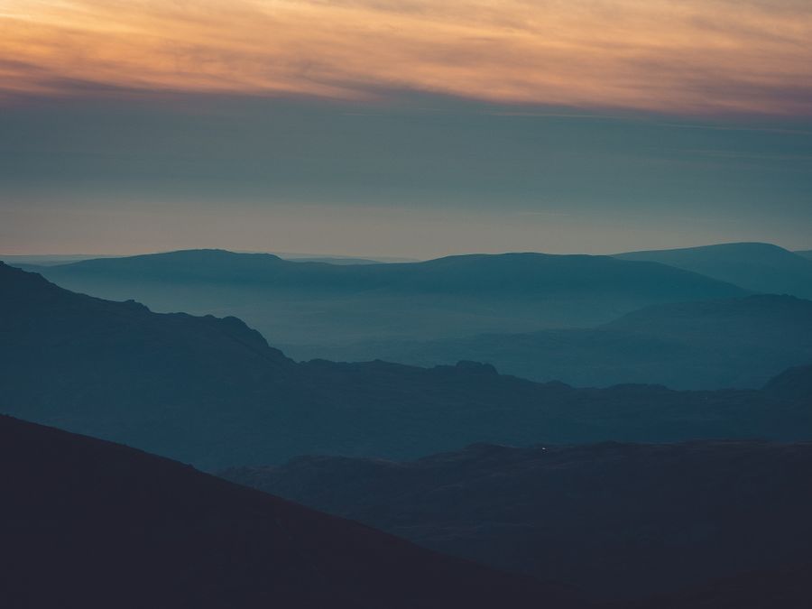 Mountain silhouettes against a twilight sky by Vintage Laka on Pexels