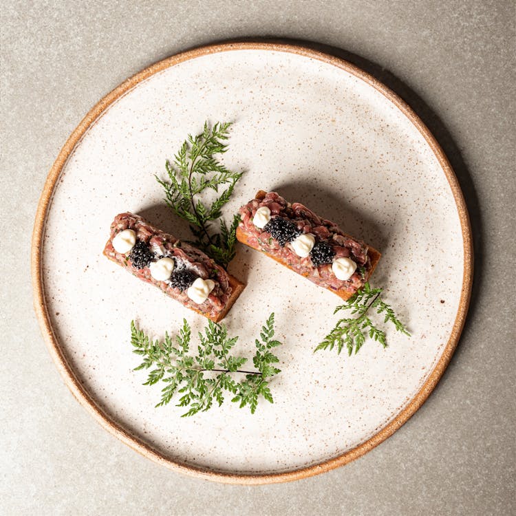 Sweet Nut And Chocolate Bars On A Plate 