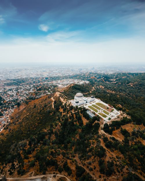Free A breathtaking aerial view of Griffith Observatory overlooking Los Angeles, CA. Stock Photo