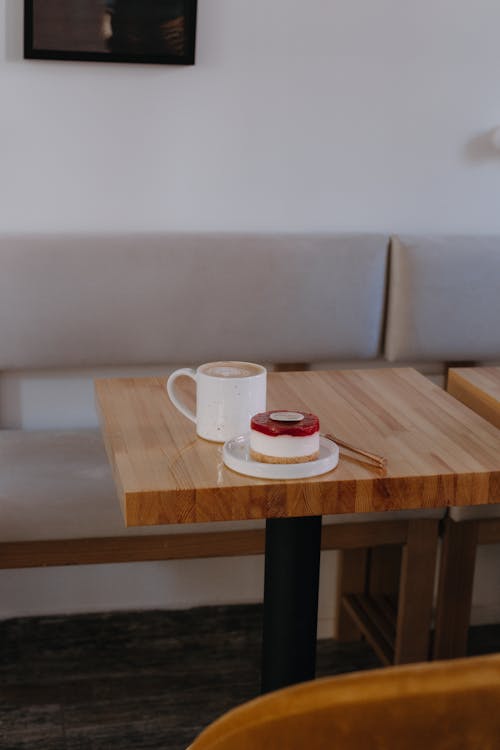 Two Coffee Cups On Wood Table In Cafe Interior Stock Photo