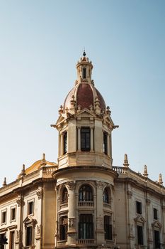 Elegant baroque architecture of Valencia Town Hall with clear blue sky.