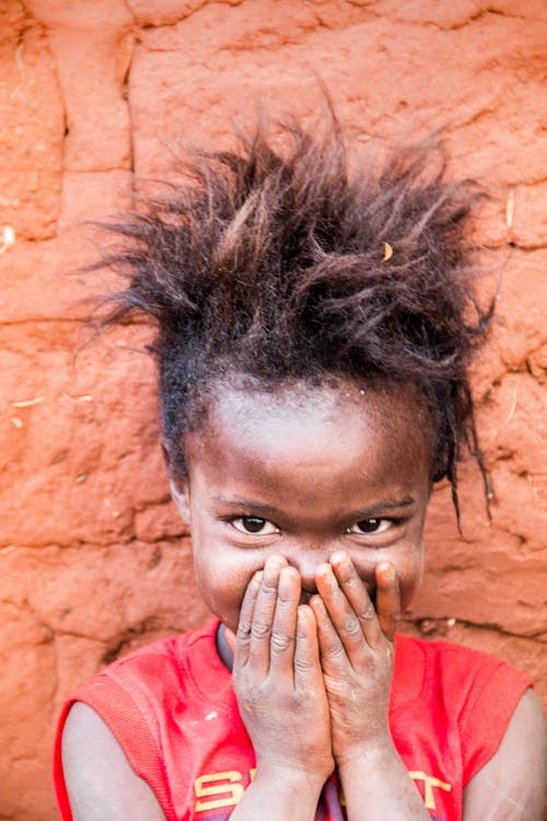 Cheerful and Shy Child