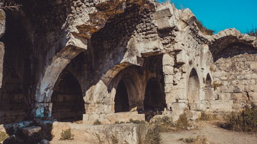 Stone Walls and Arches in the Ruins of a Building 