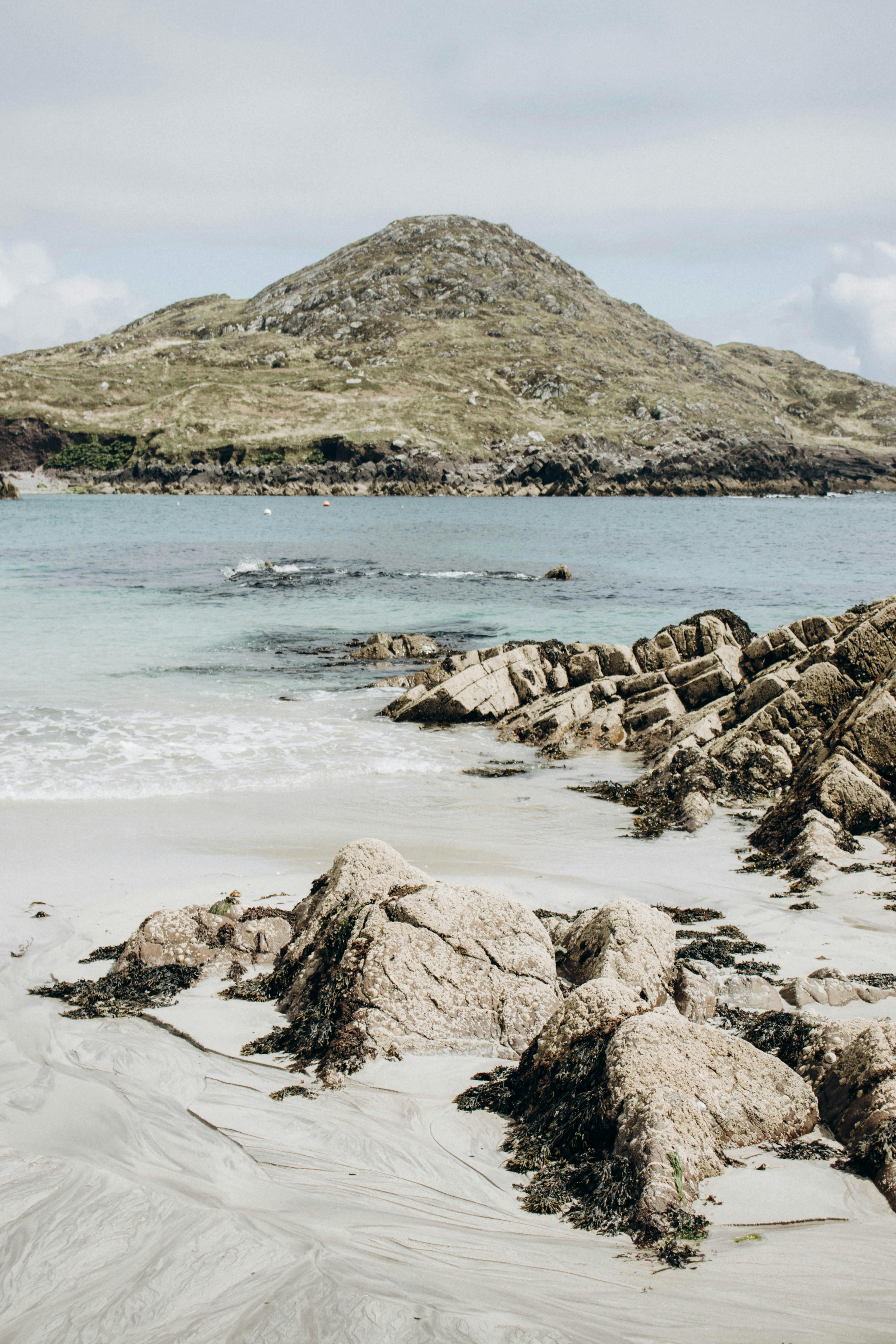 rocks on a beach of ocarrolls cove in ireland