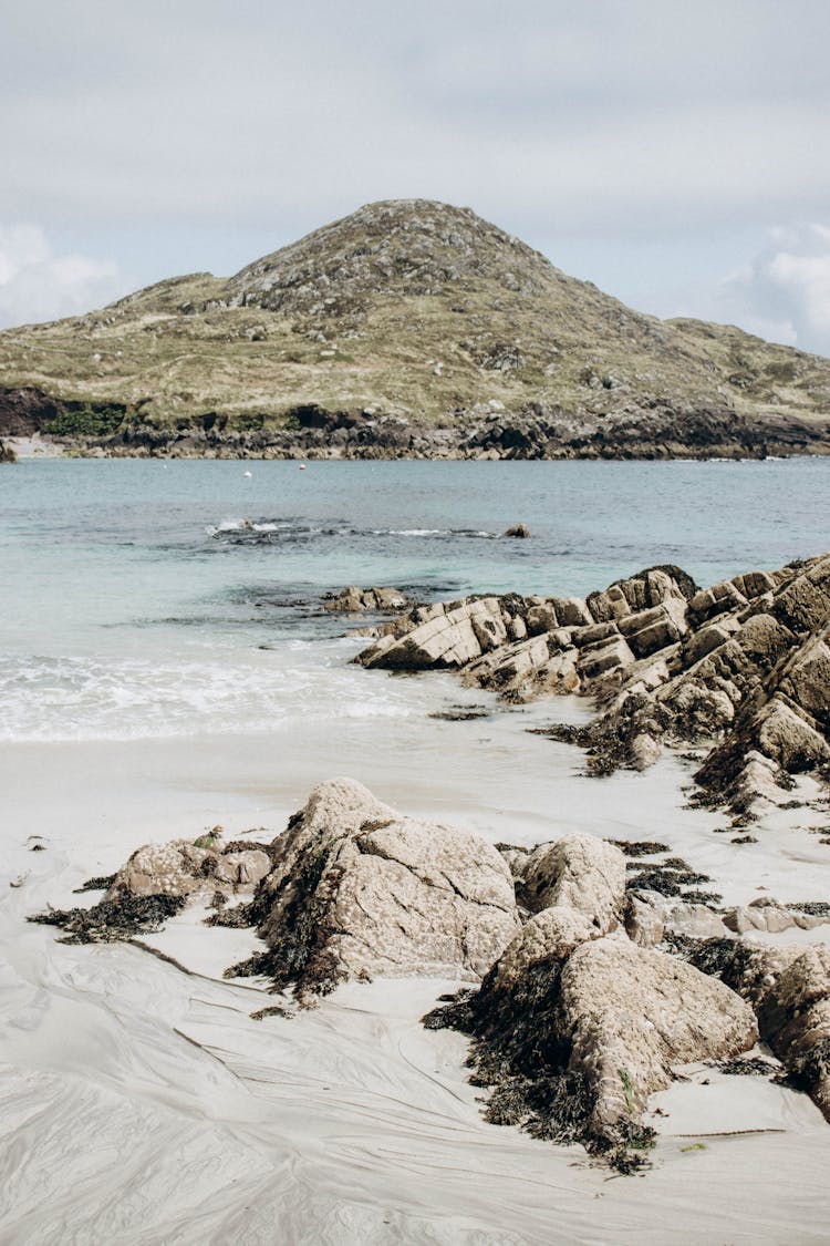 Rocks On A Beach Of OCarrolls Cove In Ireland