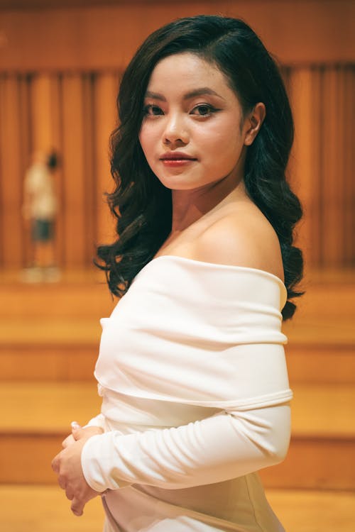 Young Brunette in an Elegant Dress