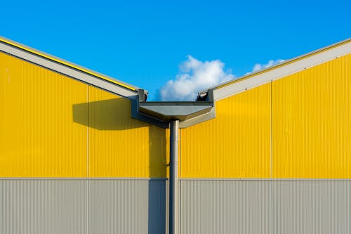 Yellow and Gray Exterior of a Building 