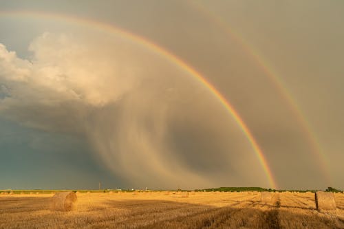 Scenic Rural Landscape with Double Rainbow