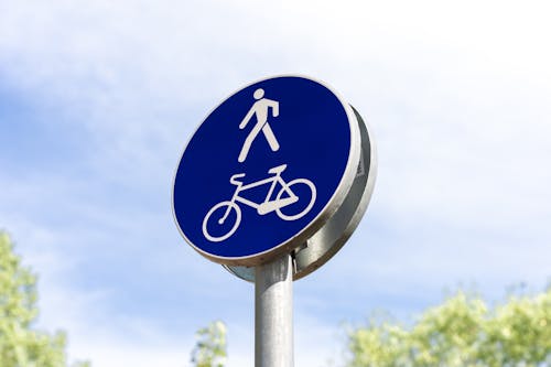 Bicycle Lane and a Pedestrian Crossing Road Sign
