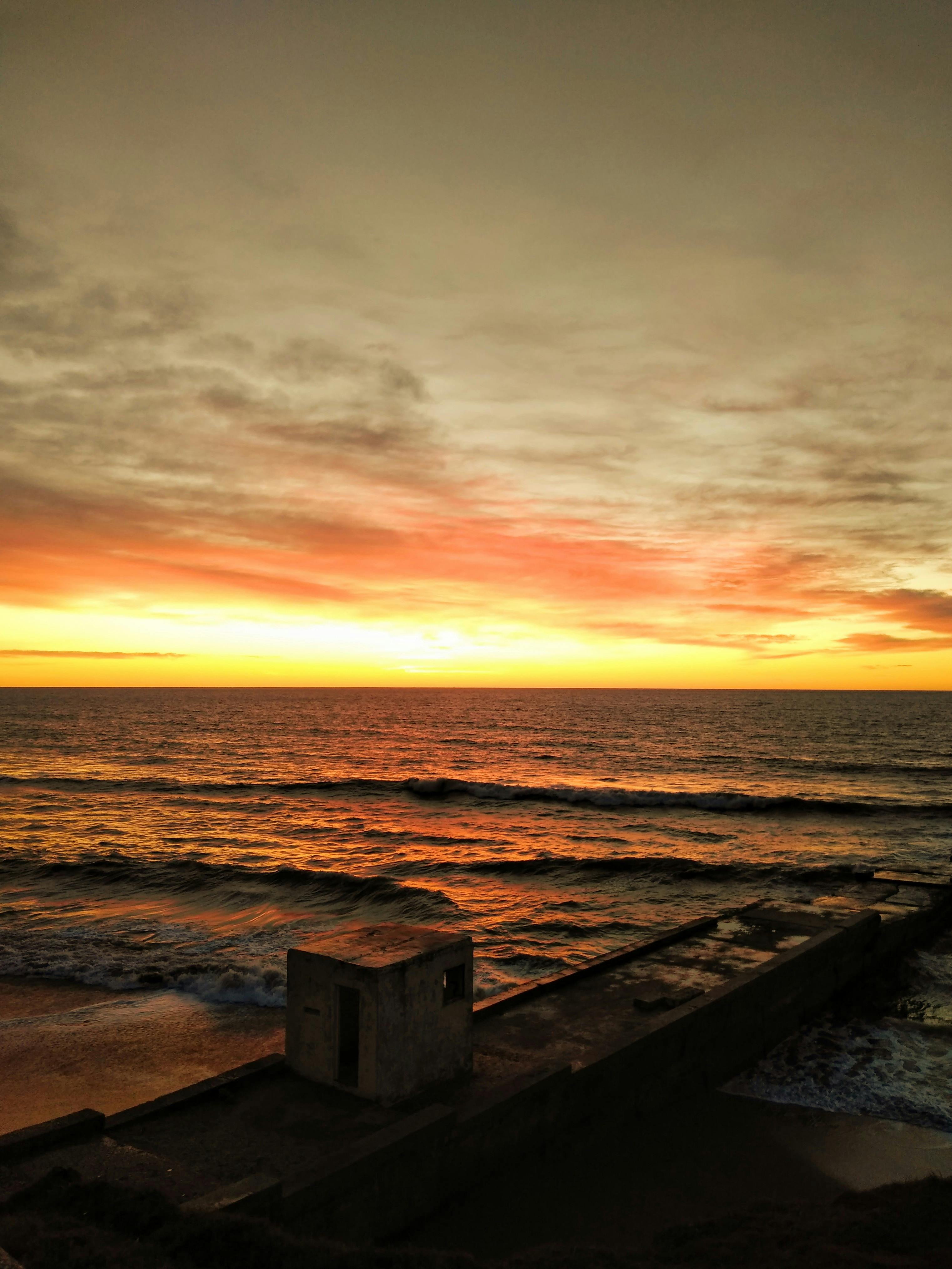 abandoned wharf at sunset