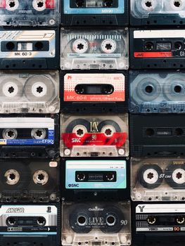 Close-up of colorful vintage audio cassettes creating a nostalgic vibe.