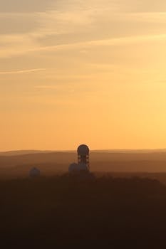 Stunning silhouette of Teufelsberg Listening Station at sunrise, Berlin.