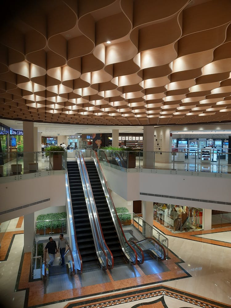 Escalators In Hall Of The Shopping Mall