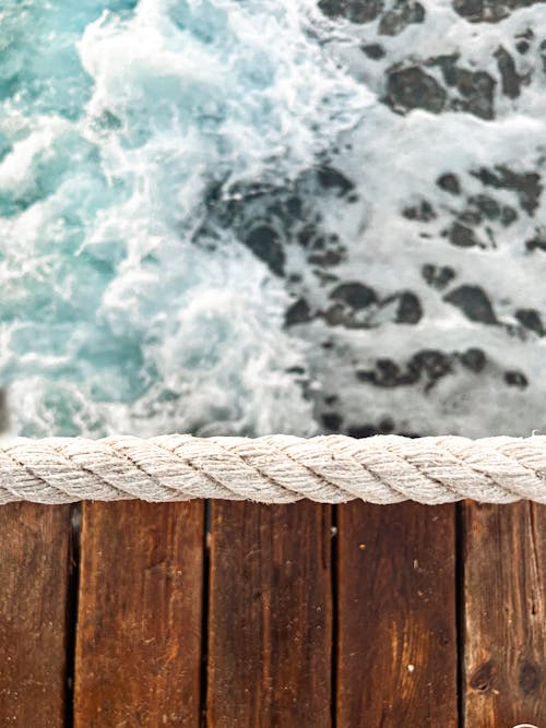 Бесплатное стоковое фото с веревка, деревянный пирс, море