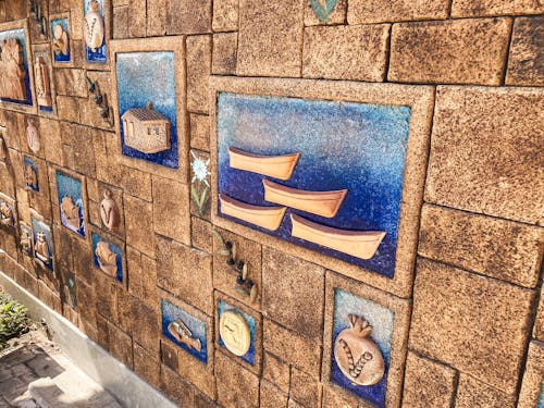 Darmowe zdjęcie z galerii z kamienna ściana, kolorowa ściana, mozaika