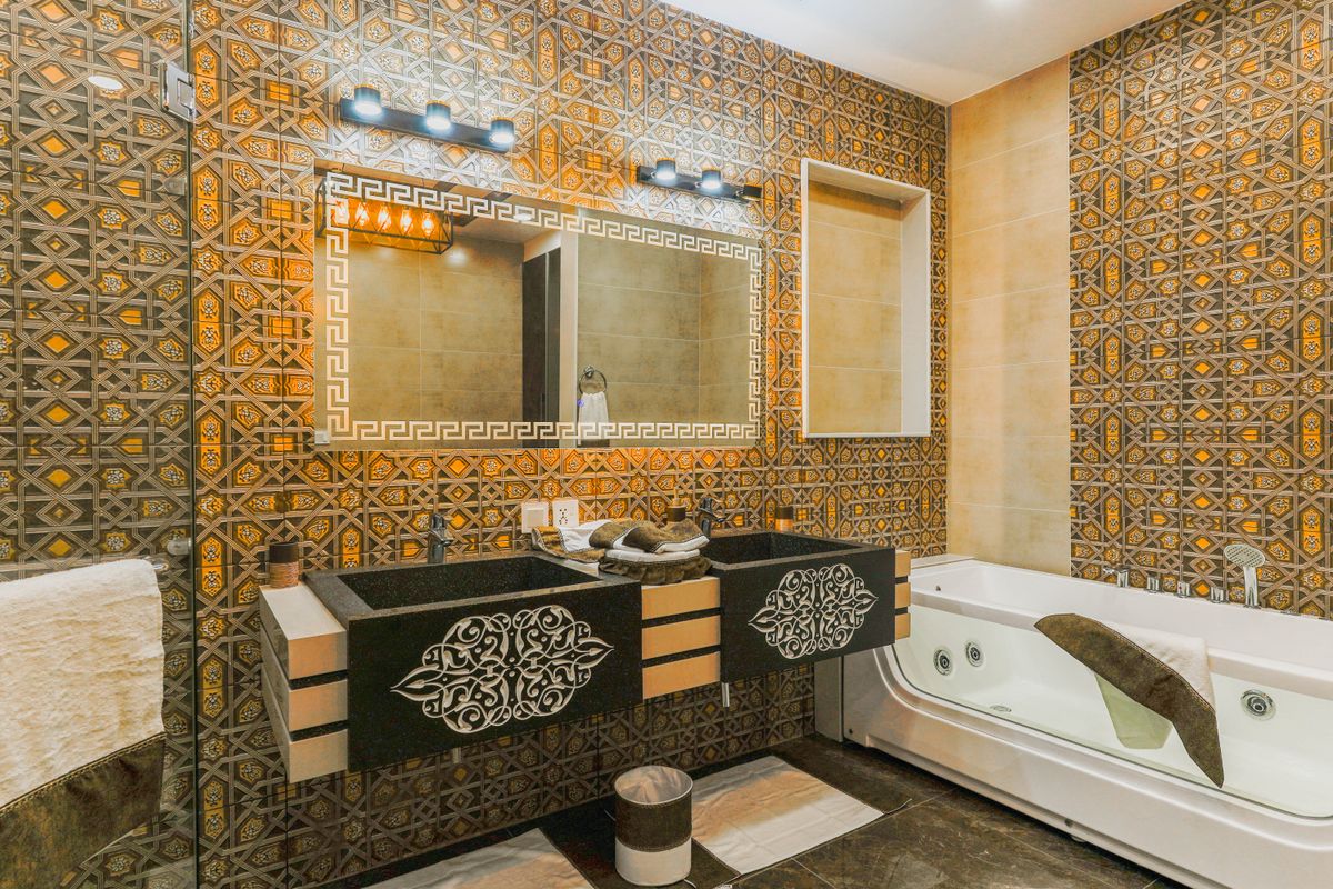 Black Bathroom Fixtures as Visual Anchors
