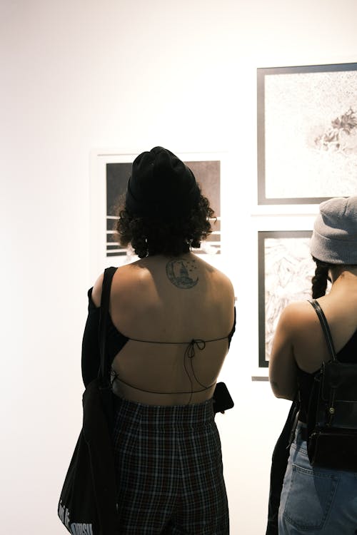 Women on an Exhibition in Art Gallery