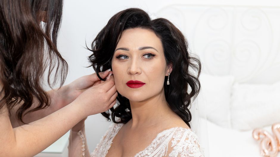 Bride preparing elegantly for her wedding ceremony