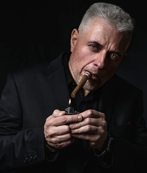 Man Lighting Cigar