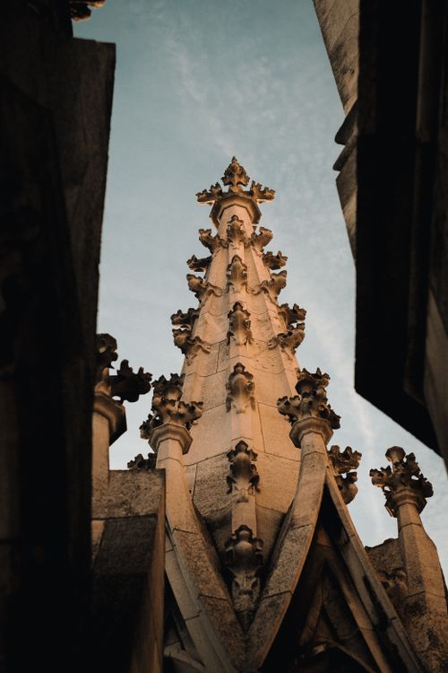 Free Detailed view of a Gothic architectural spire in Munich, Germany captured at twilight. Stock Photo