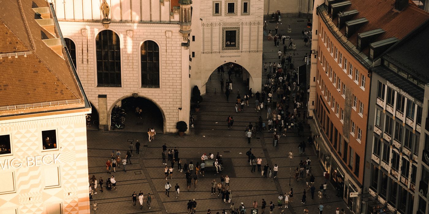 Munich old town square with historic buildings and pedestrians