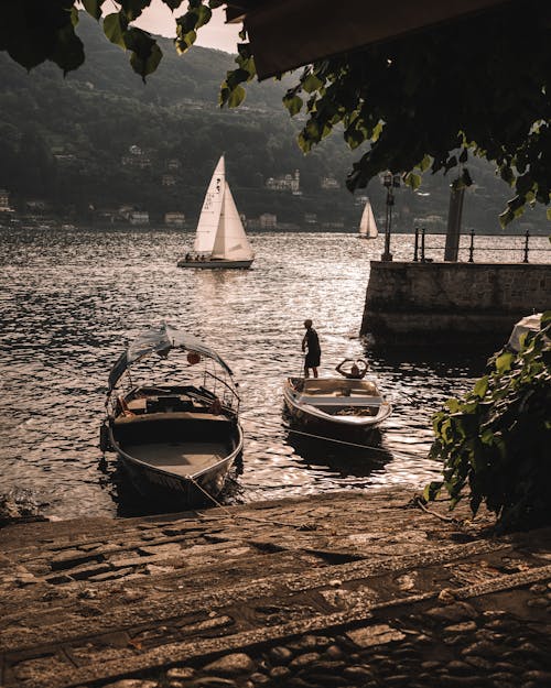 Motorboats and Sailboats on Lake Como