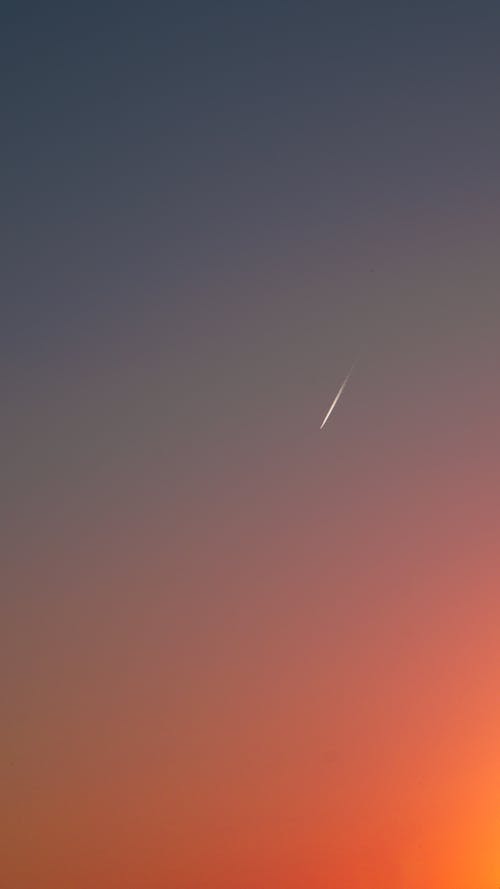 Contrail on Clear Sky at Sunset