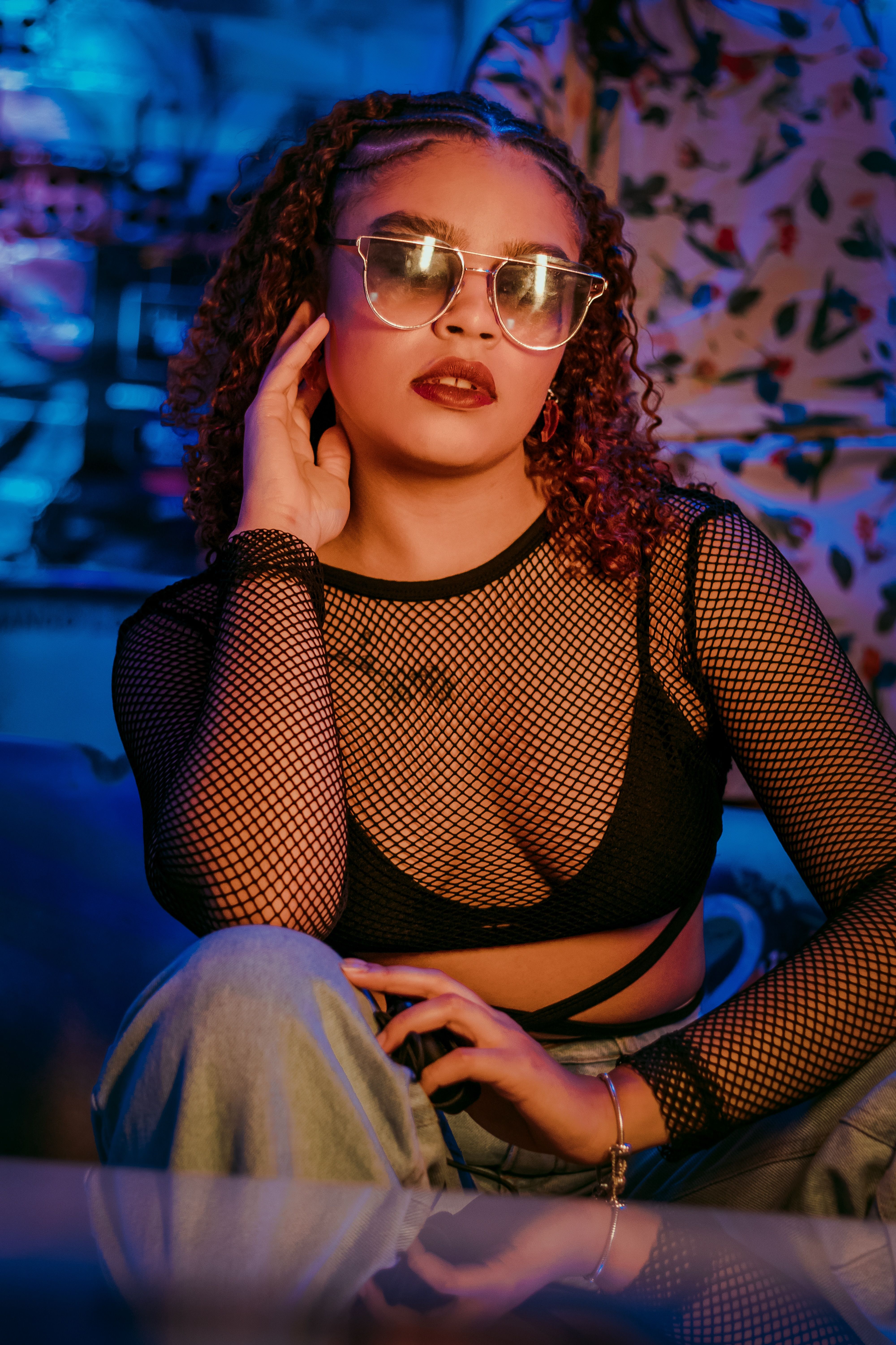 orange fishnet top