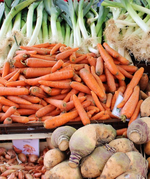 Pile of Carrots and Leeks on Market