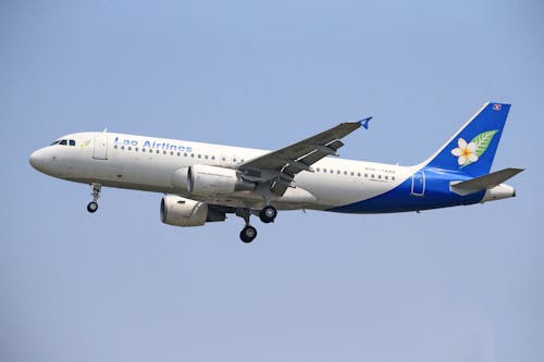 Airbus A320 of Lao Airlines Flying in Clear Sky