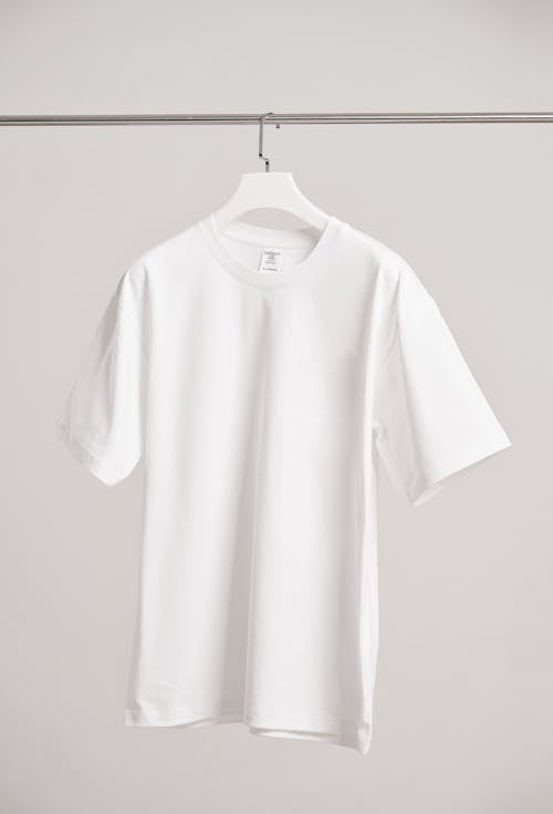 White T-Shirt Hanging on a Hanger