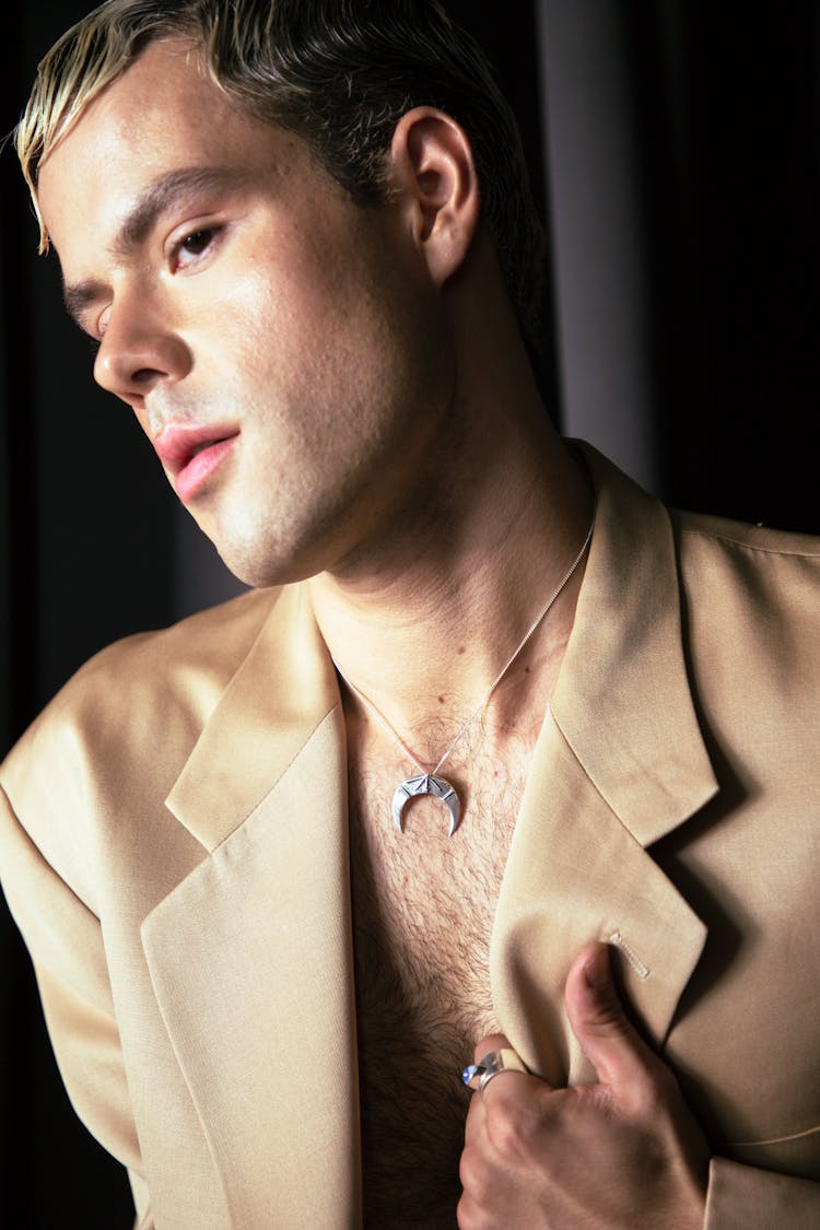 Portrait Of A Blonde Man Wearing Blazer