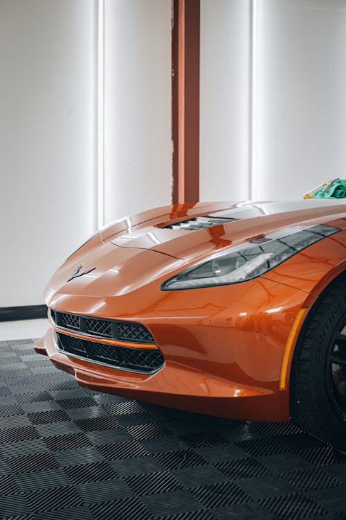 Orange Chevrolet in Car Showroom 