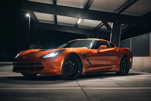 Orange Chevrolet on a Parking Lot