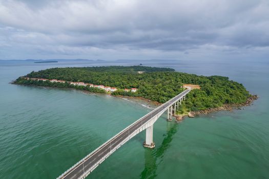 A breathtaking aerial shot of the bridge leading to Koh Rung Samloem Island in Preah Sihanouk, Cambodia.