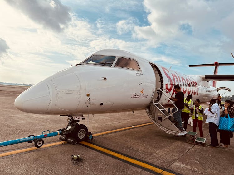 People Boarding Airplane