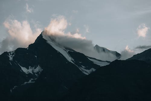 Mountain Peak Covered with Clouds